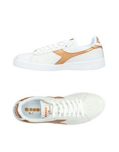 Низкие кеды и кроссовки Diadora