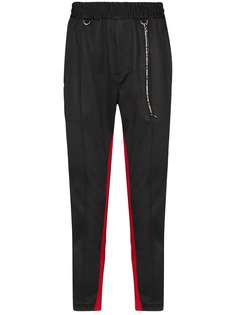 Mastermind Japan skull print side stripe track pants