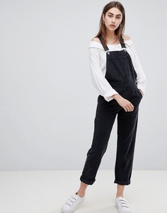 Черный выбеленный джинсовый комбинезон ASOS DESIGN