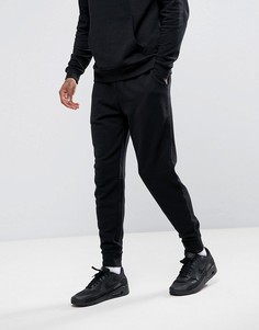 Суженные книзу черные джоггеры ASOS DESIGN-Черный