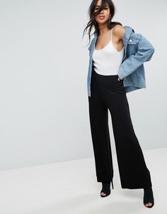 Широкие трикотажные брюки ASOS DESIGN-Черный