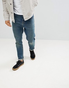 Темные суженные книзу джинсы ASOS DESIGN-Синий