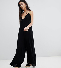 Комбинезон с глубоким вырезом и бретельками на спине ASOS DESIGN Petite-Черный