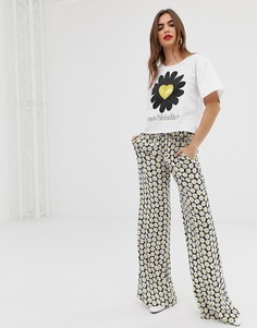 Расклешенные брюки с принтом Love Moschino-Желтый