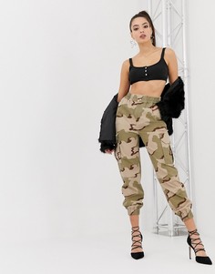 Брюки в стиле милитари с камуфляжным принтом ASOS DESIGN-Мульти