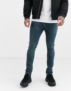 Темные супероблегающие джинсы ASOS DESIGN-Синий