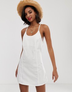 Белый джинсовый сарафан с завязкой на спине ASOS DESIGN