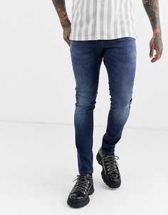 Темные супероблегающие джинсы ASOS DESIGN-Синий