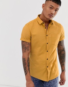 Приталенная оксфордская рубашка горчичного цвета ASOS DESIGN-Желтый