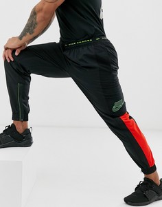 Черные суженные спортивные брюки Nike Training-Черный
