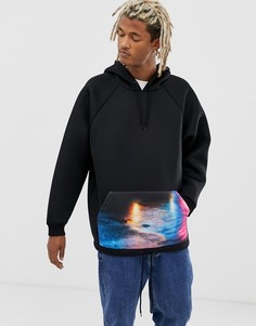 Черный oversize-худи с принтом на кармане ASOS DESIGN