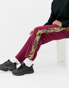 Свободные брюки со вставками с принтом пейсли и кнопками по бокам ASOS DESIGN-Красный