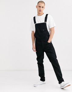 Черный джинсовый комбинезон зауженного кроя ASOS DESIGN
