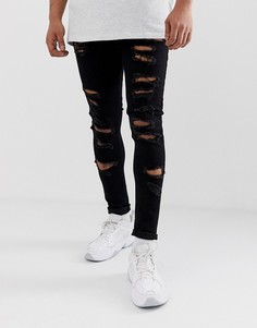 Черные джинсы стретч с рваной отделкой ASOS DESIGN-Черный