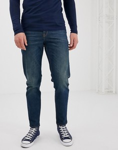 Темные суженные книзу джинсы ASOS DESIGN-Синий