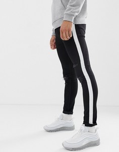 Черно-белые брюки скинни с прорехами ASOS DESIGN-Черный