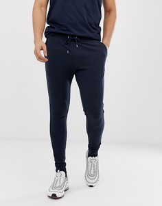 Темно-синие супероблегающие джоггеры ASOS DESIGN-Темно-синий