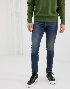 Темные супероблегающие джинсы ASOS DESIGN-Синий