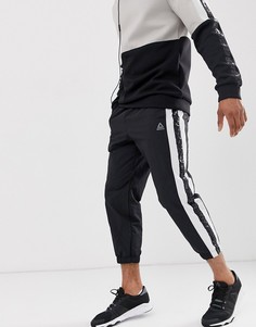 Черные суженные книзу джоггеры Reebok meet you there-Черный