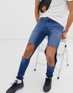 Синие джинсы с напылением и рваной отделкой ASOS DESIGN-Синий