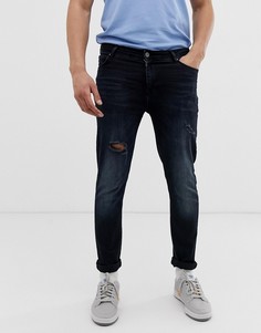 Сине-черные потертые облегающие джинсы ASOS DESIGN-Синий