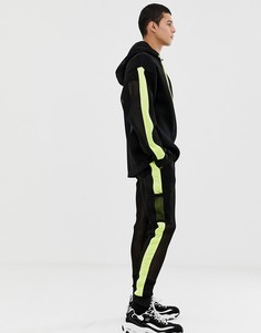 Узкие джоггеры из сетки с неоновыми вставками ASOS DESIGN-Черный