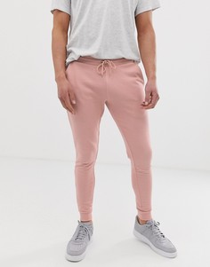 Розовые джоггеры суперскинни ASOS DESIGN-Розовый