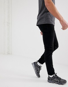 Выбеленные черные джинсы скинни ASOS DESIGN-Черный