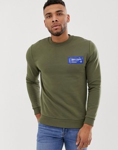 Свитшот цвета хаки с принтом на груди ASOS DESIGN-Зеленый