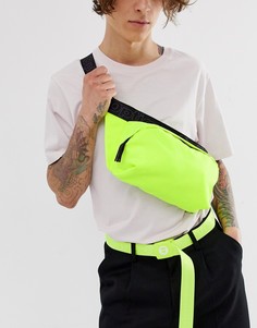 Неоново-желтая большая сумка-кошелек на пояс с надписью на ремешке ASOS DESIGN-Желтый