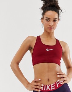 Красный бюстгальтер с логотипом-галочкой Nike Training