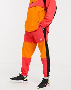 Розовые спортивные штаны с логотипом Nike-Розовый