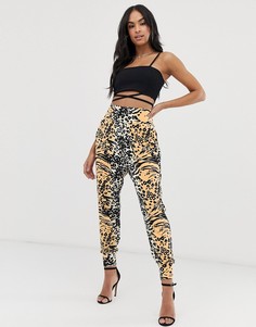 Брюки с заниженным шаговым швом и анималистичным принтом ASOS DESIGN-Мульти