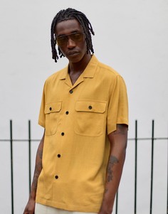 Свободная льняная рубашка горчичного цвета с двумя карманами ASOS DESIGN-Желтый