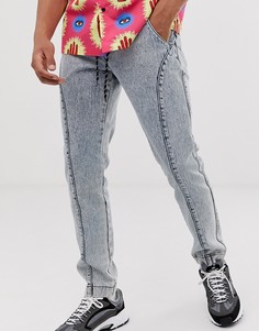 Синие джинсы слим со вставками и эффектом кислотной стирки ASOS DESIGN-Синий