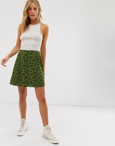 Зеленая мини-юбка на пуговицах с цветочным принтом ASOS DESIGN-Мульти