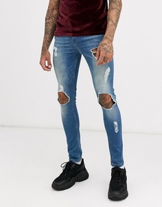 Синие джинсы скинни с рваной отделкой ASOS DESIGN-Синий