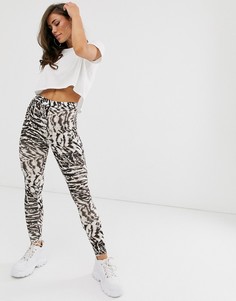 Леггинсы со звериным принтом ASOS DESIGN-Мульти