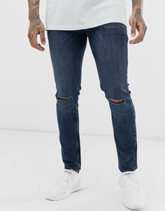 Сине-черные зауженные джинсы с прорехами на коленях ASOS DESIGN-Синий