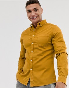 Облегающая джинсовая эластичная рубашка горчичного цвета ASOS DESIGN-Желтый