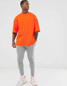 Оранжевая oversize-футболка с разрезами по бокам ASOS DESIGN-Оранжевый