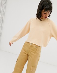 Укороченный свитшот персикового цвета с длинными рукавами Monki-Оранжевый