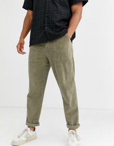 Выбеленные свободные вельветовые брюки цвета хаки с карманами в стиле милитари ASOS DESIGN-Зеленый