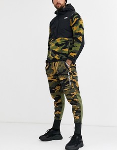 Джоггеры цвета хаки с камуфляжным принтом The North Face-Зеленый