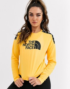 Желтый кроп-топ с длинными рукавами The North Face TNL