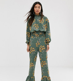 Зеленые брюки с цветочным принтом и оборками Monki-Зеленый