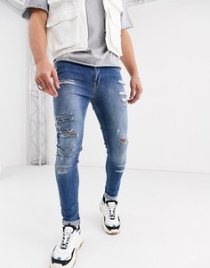 Светло-синие рваные джинсы скинни ASOS DESIGN-Синий