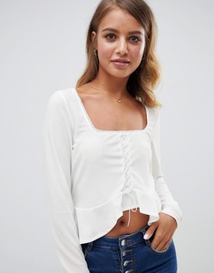 Лонгслив с оборкой и шнуровкой ASOS DESIGN-Белый