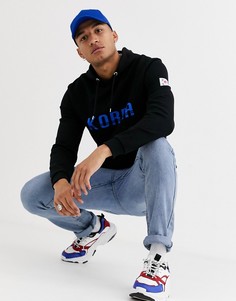 Черный худи с принтом на спине и нашивками ASOS DESIGN