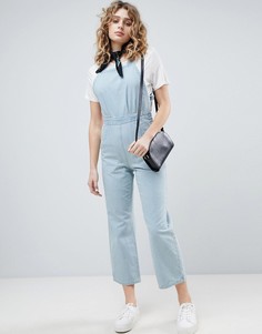 Синий джинсовый комбинезон с перекрестными бретелями на спине ASOS DESIGN